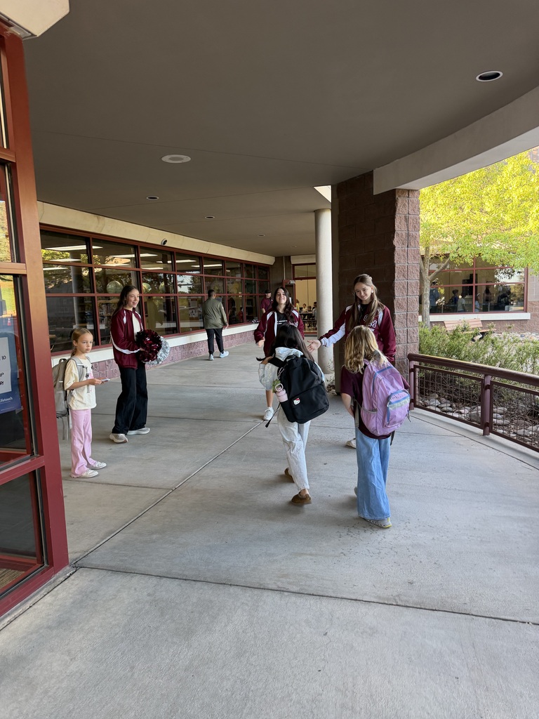 A great start to the morning! Our CMHS football players and cheerleaders gave high-fives to our GCE Cougars as they headed off to breakfast. What a fun way to kick off the day with Cheyenne Mountain spirit!