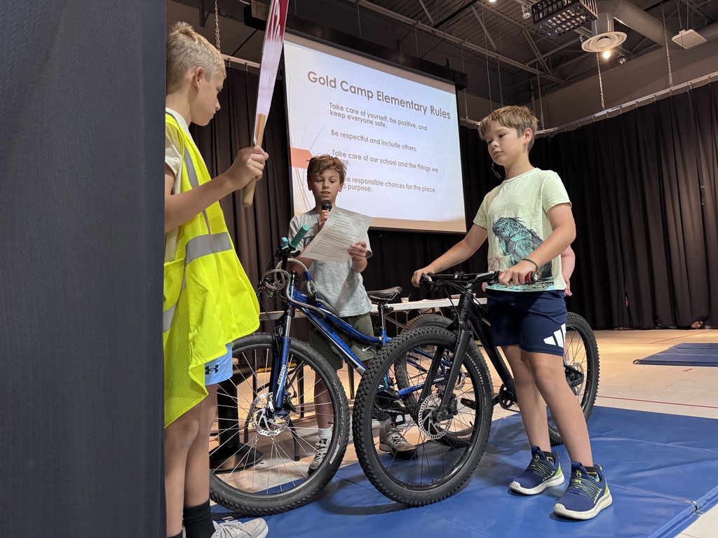Our first Gold Camp School Assembly brings students and staff together to celebrate their collaborative work in establishing shared expectations, formally introducing and ratifying the four schoolwide rules, and exploring what those rules look and sound like across different common areas of the school.