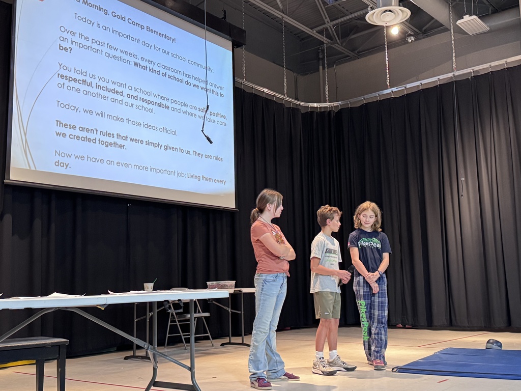 Our first Gold Camp School Assembly brings students and staff together to celebrate their collaborative work in establishing shared expectations, formally introducing and ratifying the four schoolwide rules, and exploring what those rules look and sound like across different common areas of the school.
