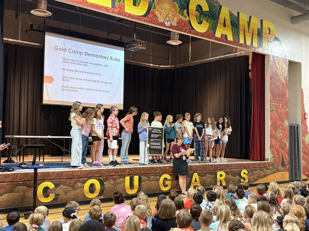 Our first Gold Camp School Assembly brings students and staff together to celebrate their collaborative work in establishing shared expectations, formally introducing and ratifying the four schoolwide rules, and exploring what those rules look and sound like across different common areas of the school.