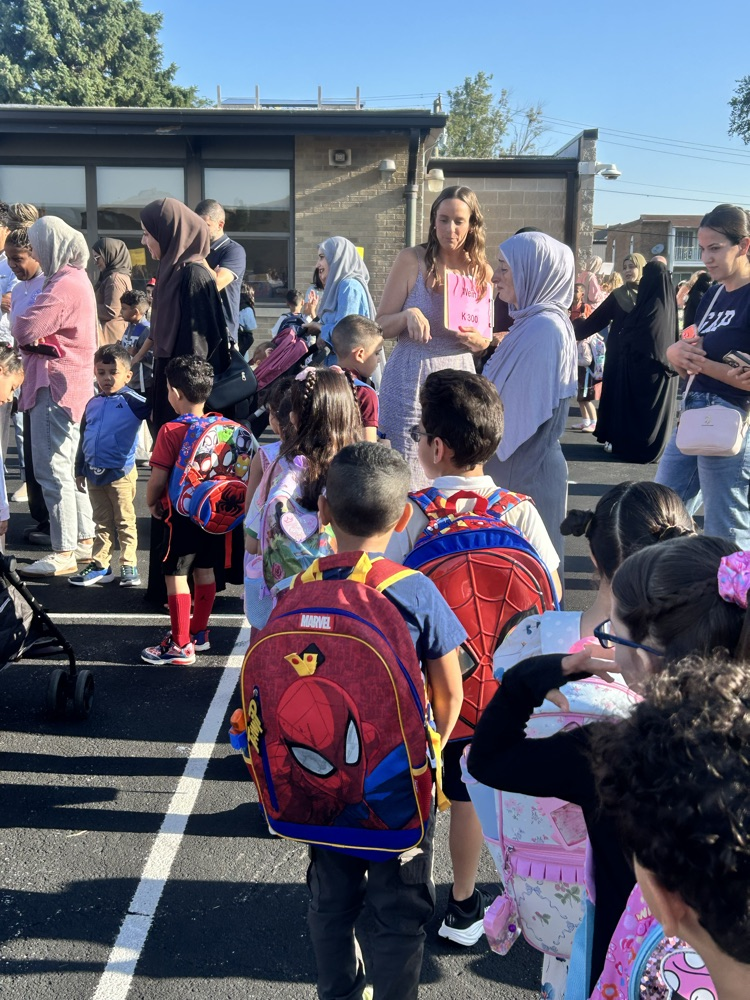 Students lining up with their teacher