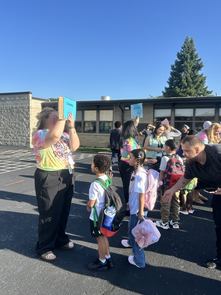 Students lining up with their teacher 