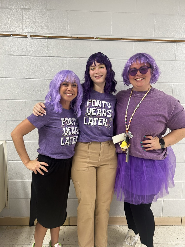 Everyone dressed in purple