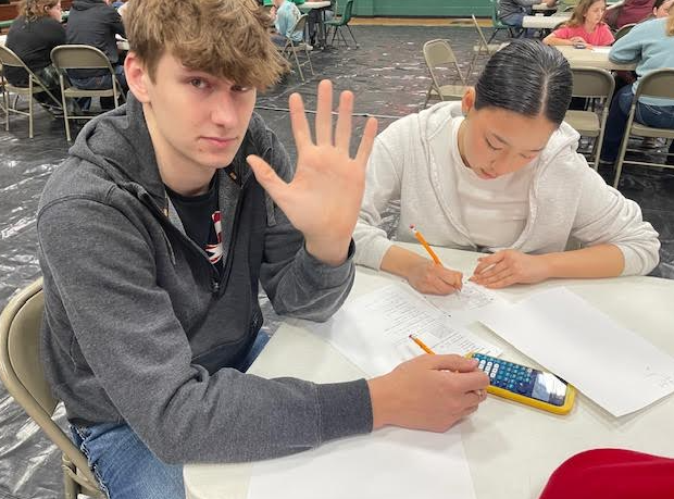 Holden and Anya working on the team test