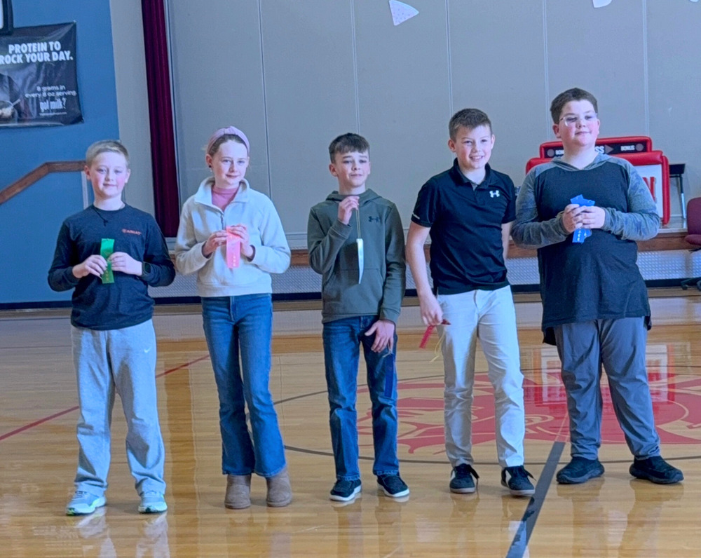 Math contest winners with ribbons.