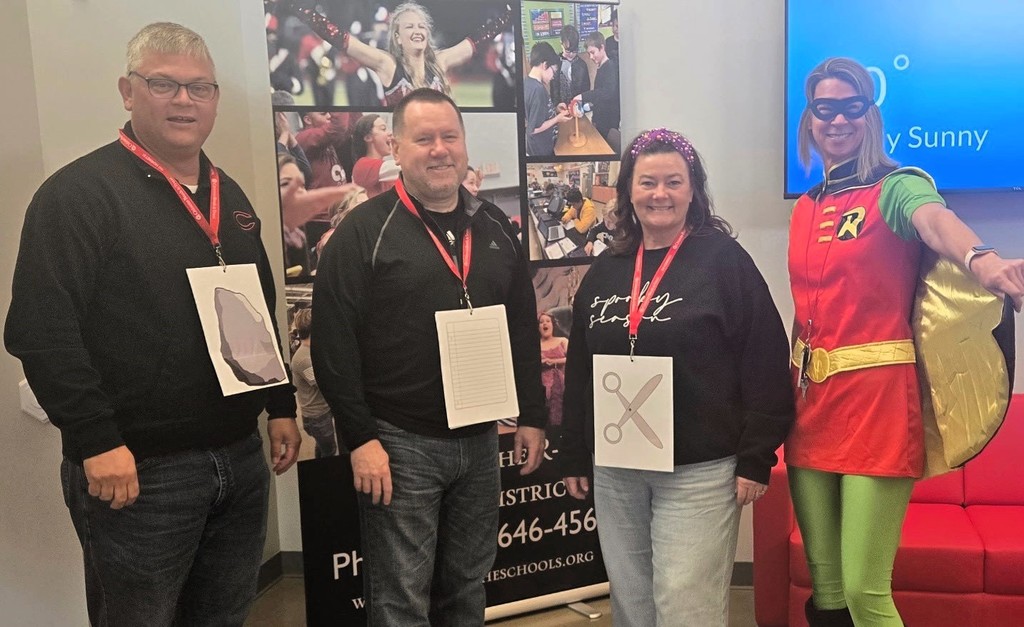 Happy Halloween from Chillicothe R-II School District. Dr. Dan Wiebers dressed as "Rock," Assistant Superintendent Dr. Brian Sherrow dressed as "Paper," Melissa Young, Director of Studet Support Services and Educational Technology as "Scissors." Angela Nagel, Payroll and Benefits Administrator, dressed as "Robin."