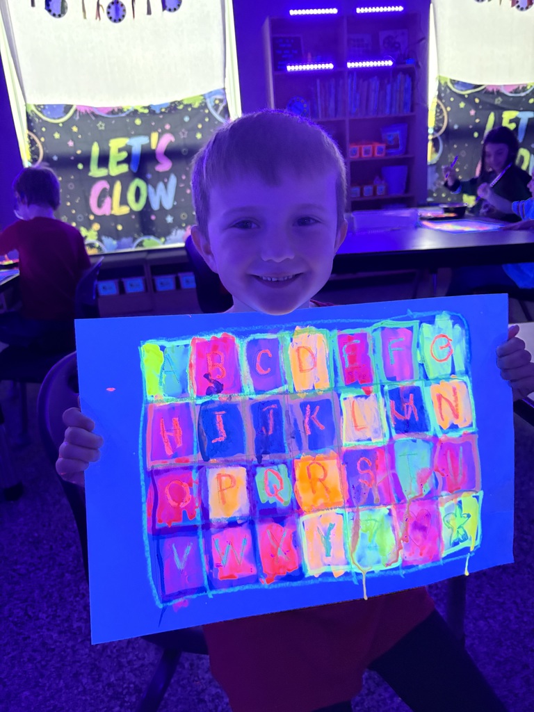 CES Art Student with glow art.