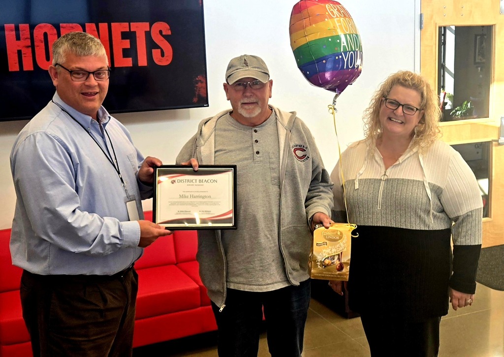 Mike Harrington - District Beacon Award Nominee with Superintendent Dr. Dan Wiebers and Emily Schmidt, Director of Special Services.