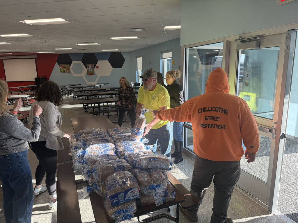 City Hall and CES Counselors organize food boxes for CES students.