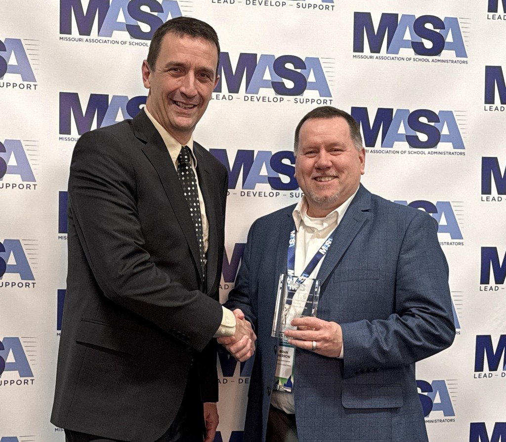 Dr. Brian Sherrow receives the Assistant Superintendent of the Year award at the Spring Conference of the Missouri Association of School Administrators Conference this week.