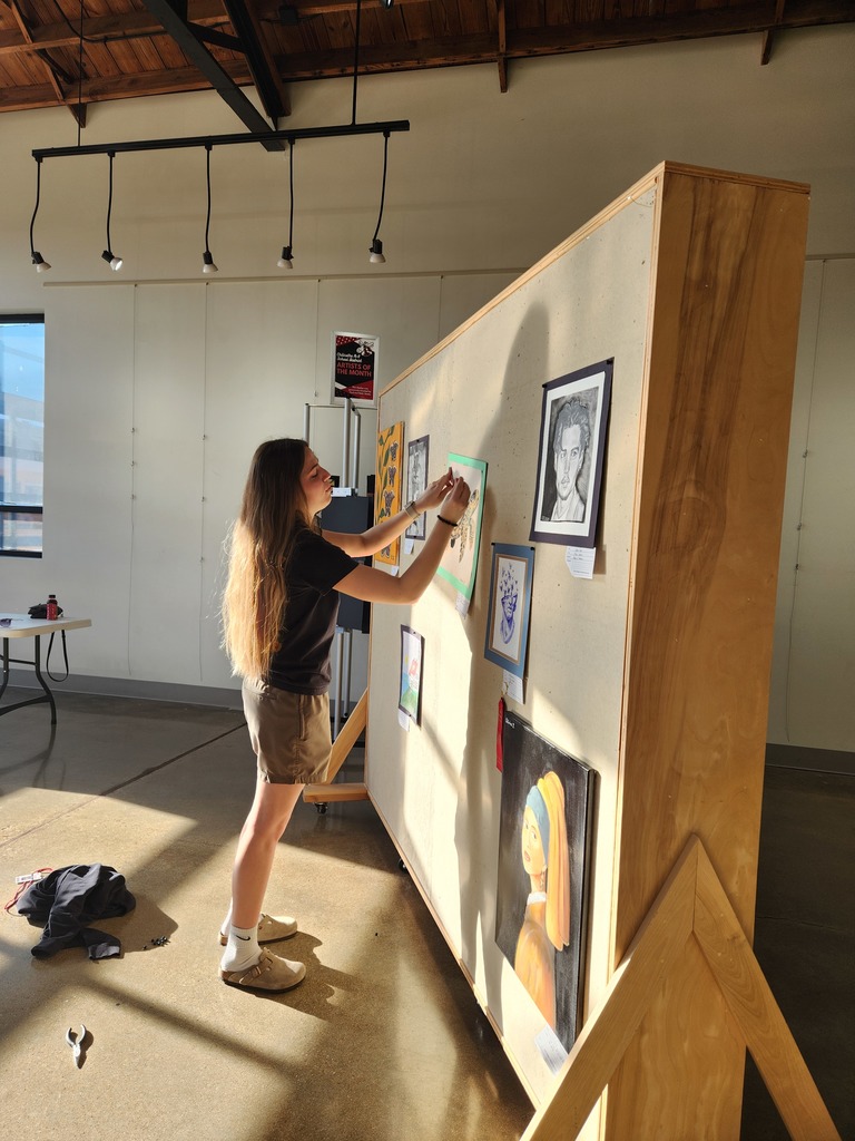 CHS Art Master Students preparing for their exhibt at the Cultural Corner