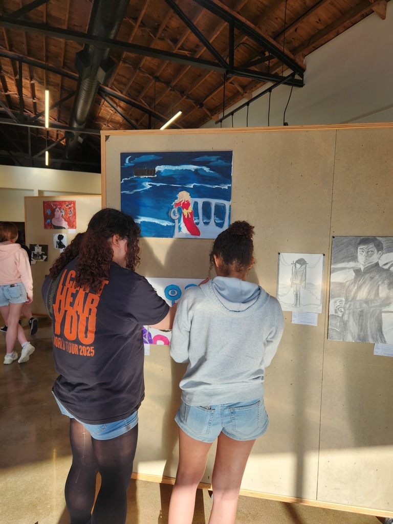 CHS Art Master Students preparing for their exhibt at the Cultural Corner