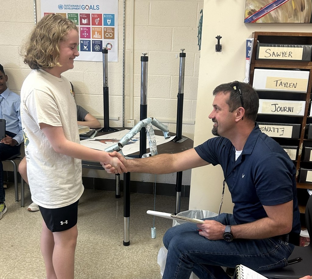 Shark Tank kid shaking hands with Matt Gabrielson