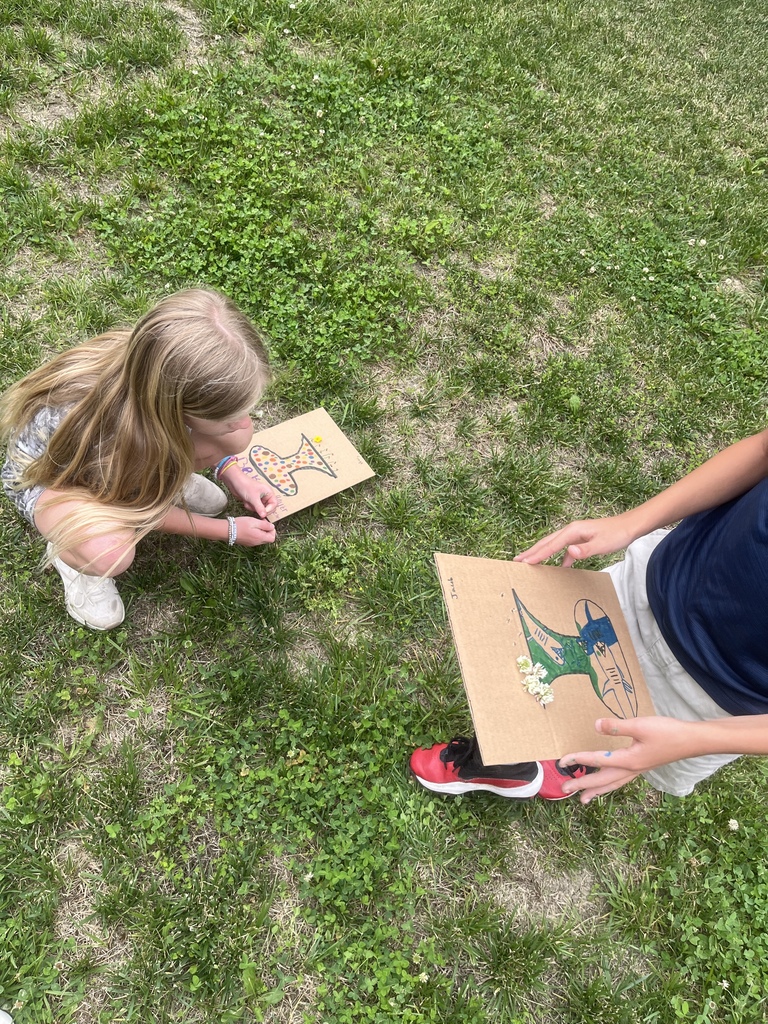 Children making vases as an art project during Summer School today.