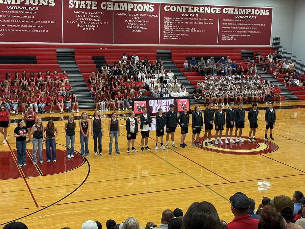 The CHS Cross Country team is introduced  during Meet the Hornets last night.