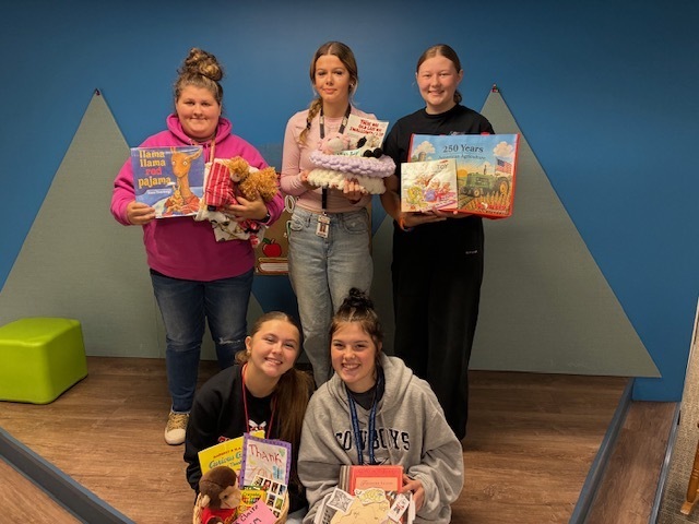 ECP Students with their books.