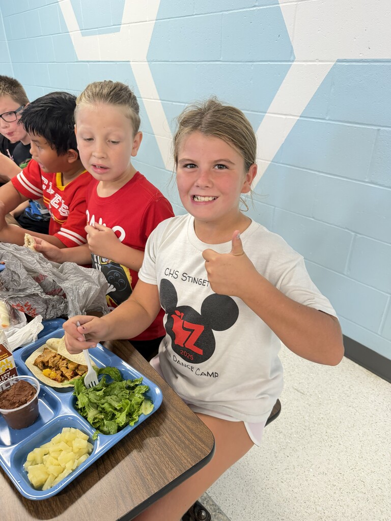 CES Student gives a thumbs up during "Tasting Tuesday's" lunch.