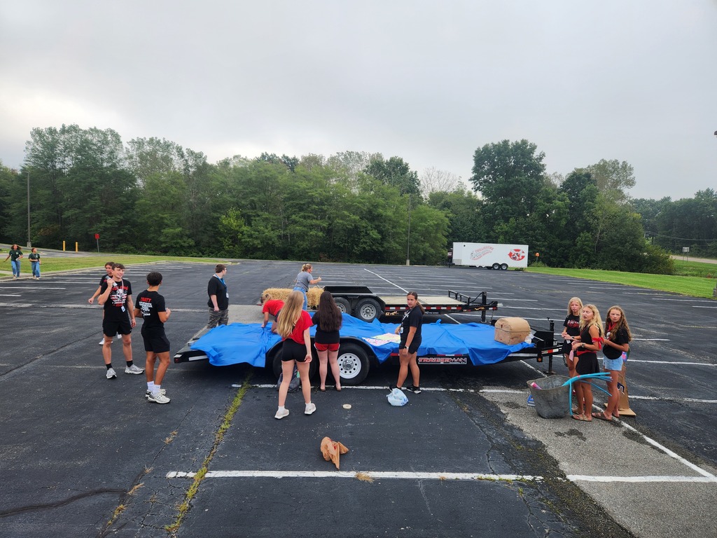 CHS Students building a float in the PAC Parking lot this morning.