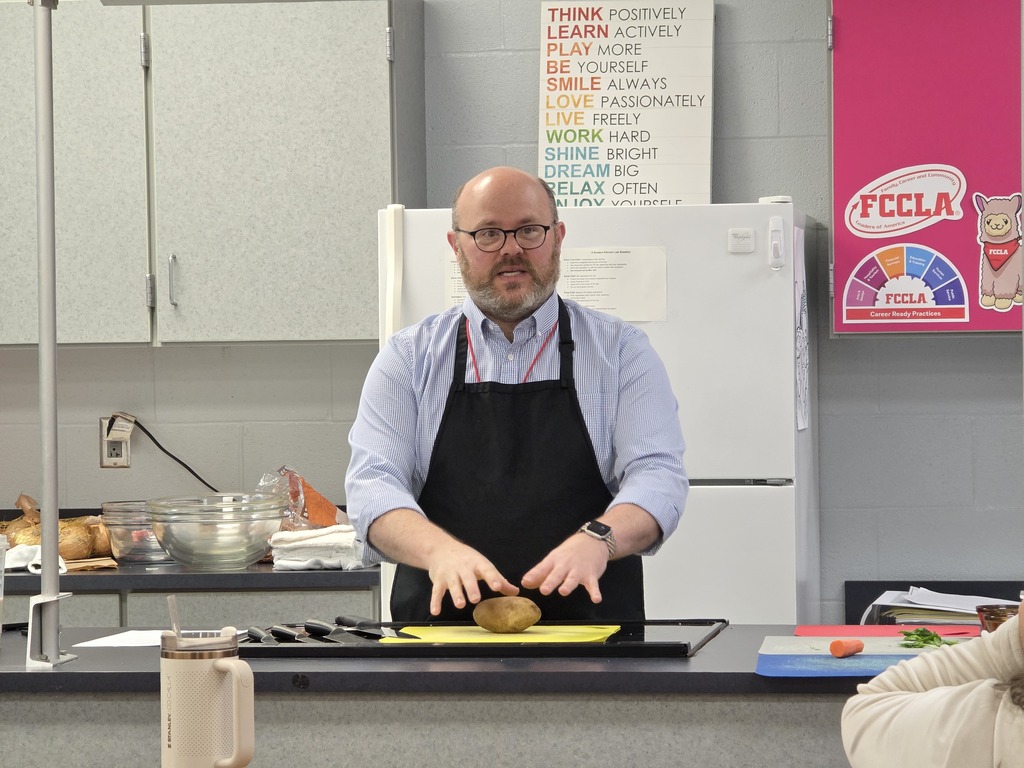Dustin Rennells speaking to Mrs. Hall’s Foods classes .