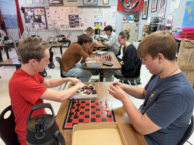 A photo showing the CHS Chess Club that meets Tuesday mornings at CHS.