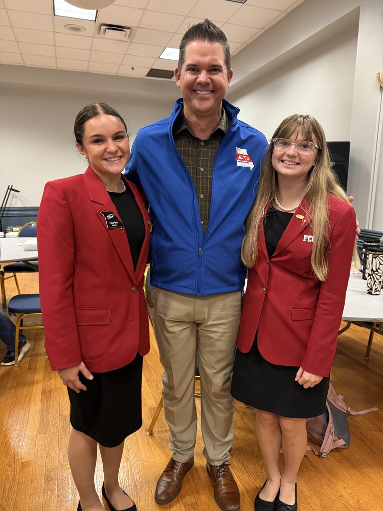 Addi Edds and Lydea Britt with Travis Plume at the FCCLA Roadshow and DESE Family & Consumer Sciences Mentoring meetings.