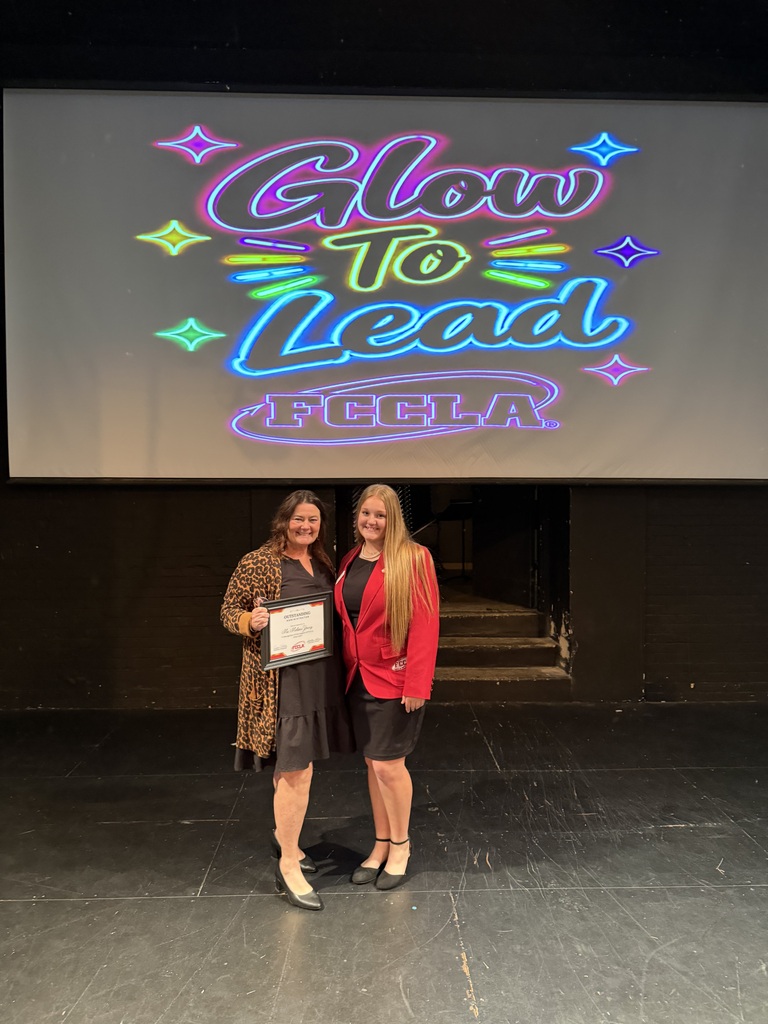 Melissa Young receiving the Region 2 FCCLA Outstanding Administrator Award at the Region 2 Meeting on October 14 at the University of Central Missouri