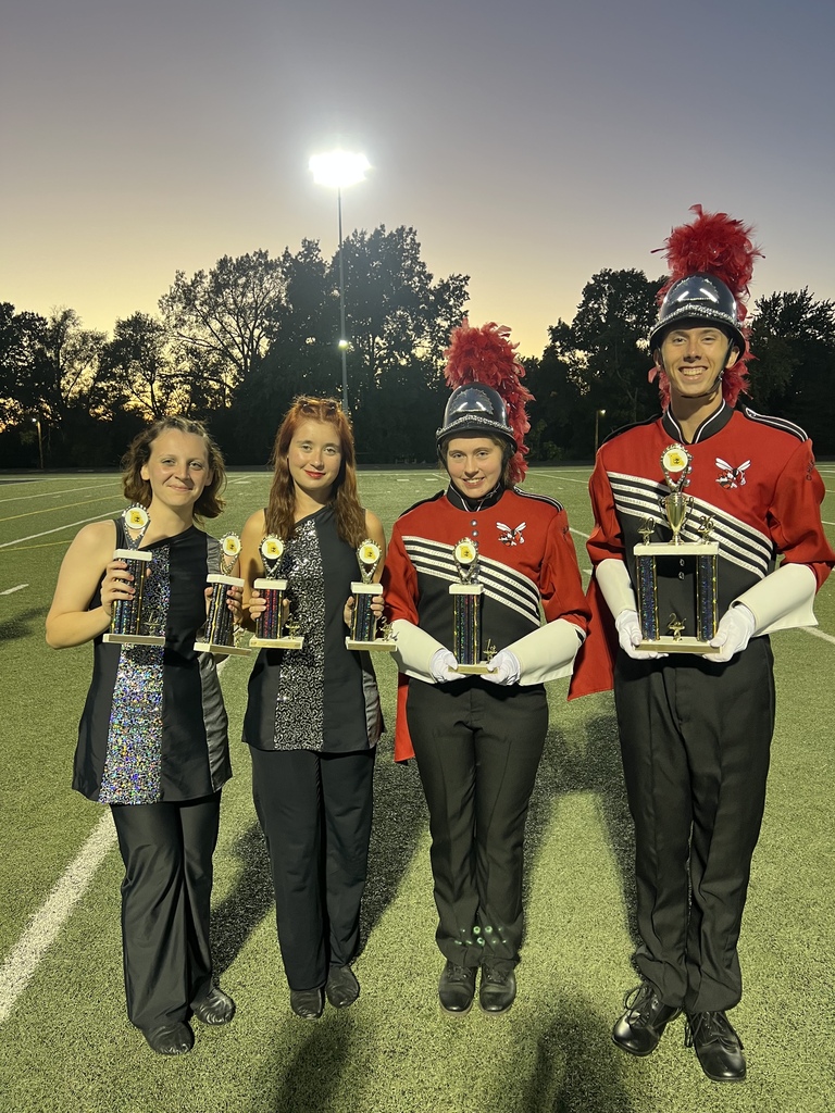 CHS Bandd Students holding trophies Saturday after the Cameron Band MarchFest.