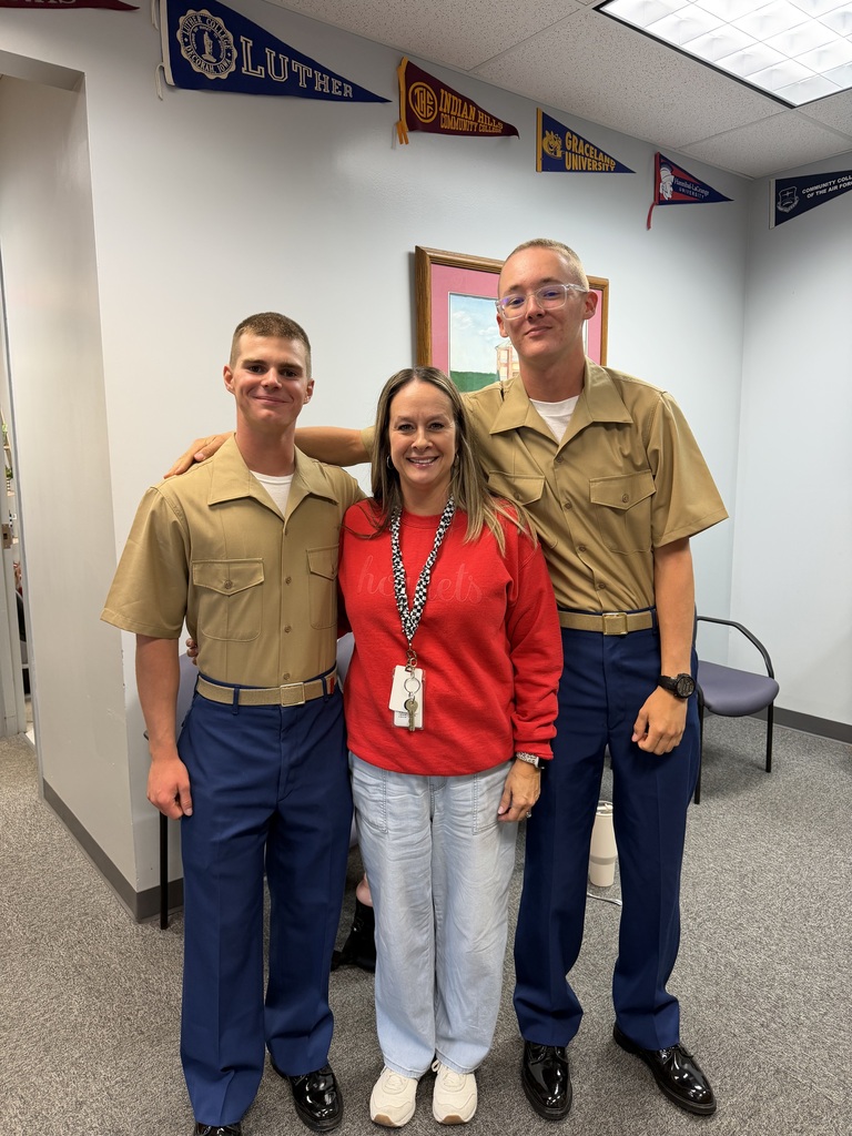 Mrs. Carla Kelly ith Gabe Hind and Nick Jackman.