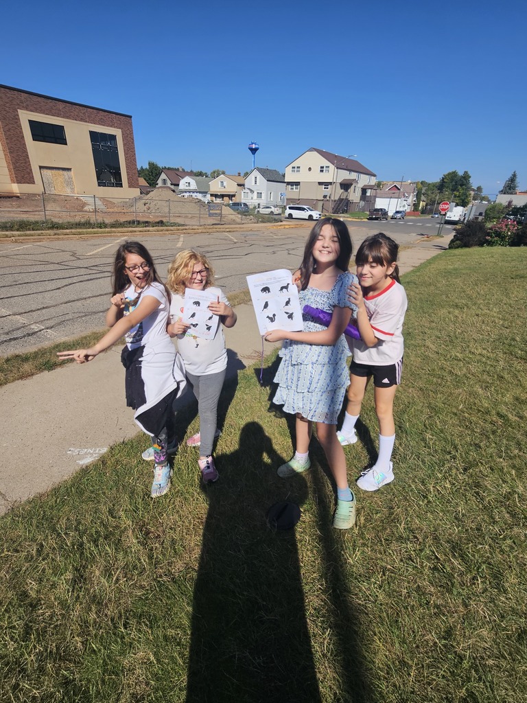 Students participating in an Ojibwe scavenger hunt during lunch recess.