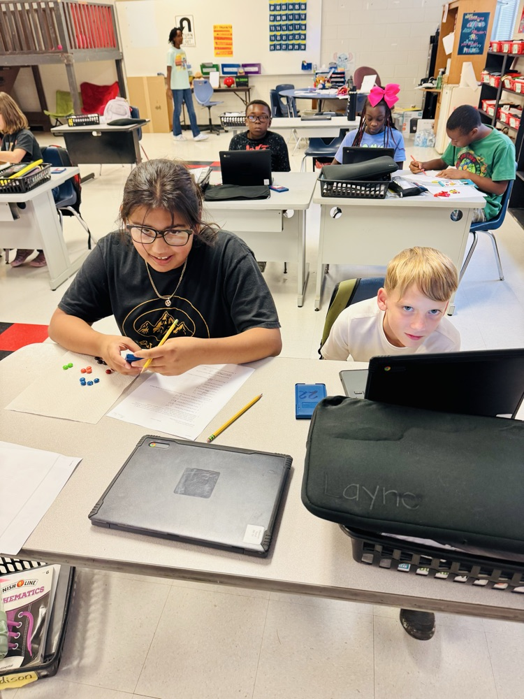 Students learning about ratios and proportions