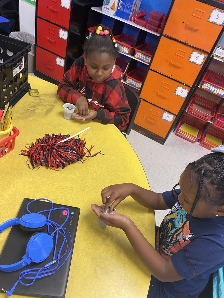 1st Grade students plant seeds and make LEGO model plants
