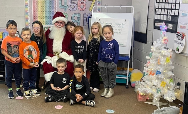 Santa visits our Pre K and Kg Students.