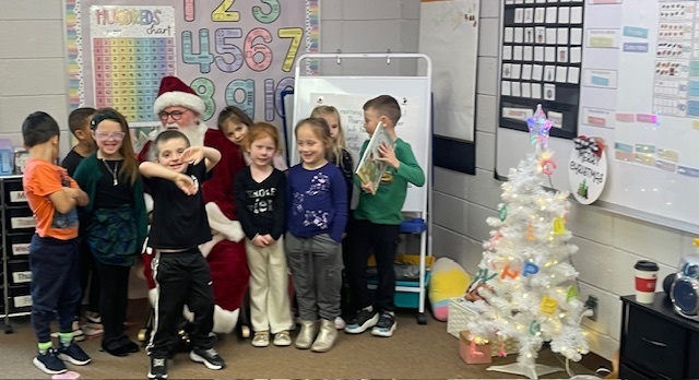 Santa visits our Pre K and Kg Students.