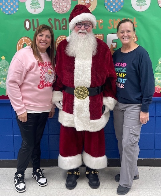 Santa visits our Pre K and Kg Students and teachers.