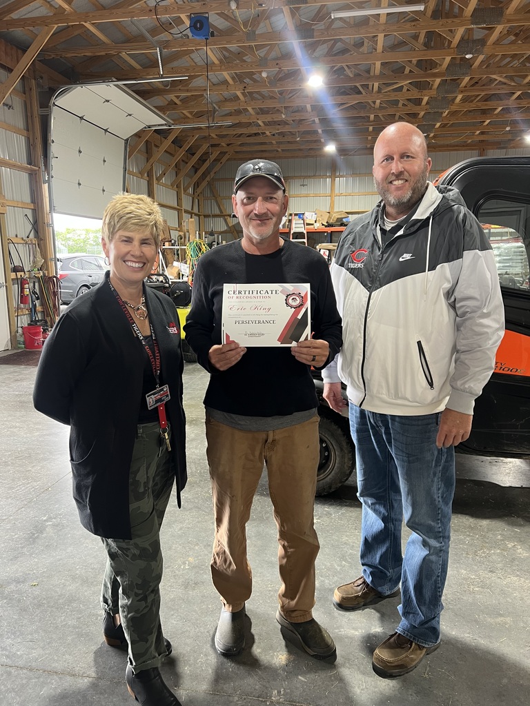 eric king is recognized by dr. halley and matt mclaghlin for his perseverance