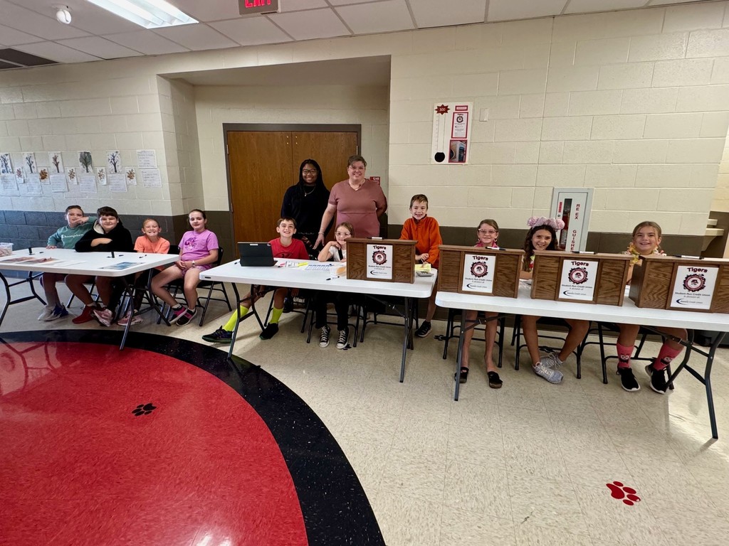 fifth grade students ready to take deposits