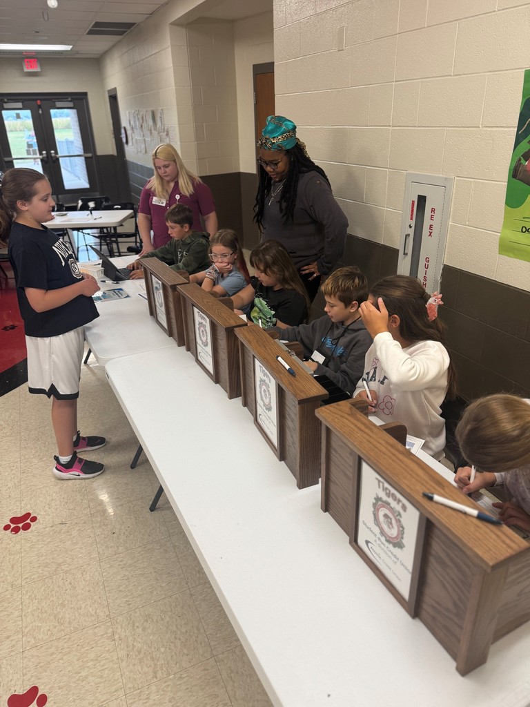 students make deposits at atomic credit union