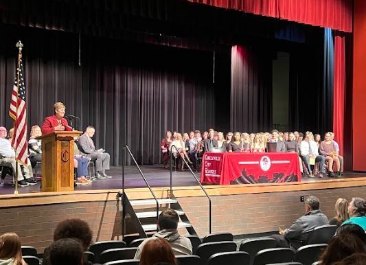 Dr halley speaks to new members