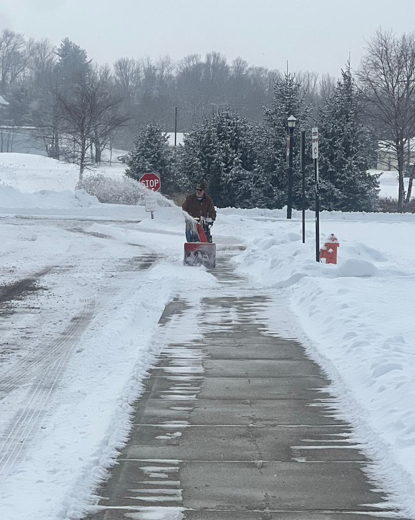 maintenance crews clearing sidewalks