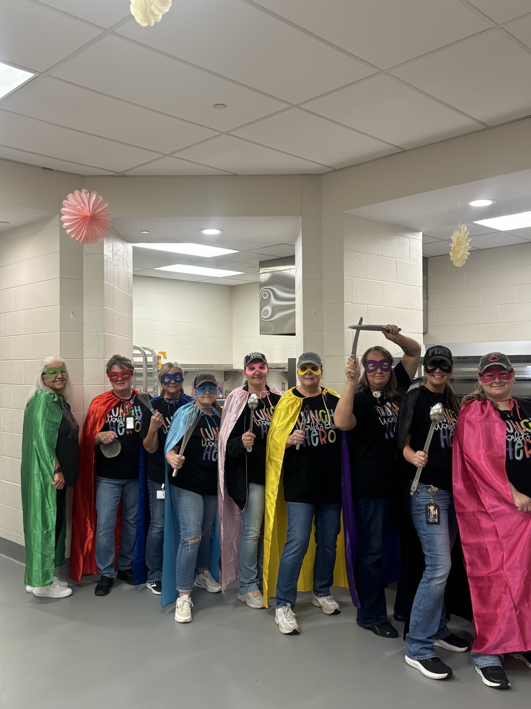 lunch ladies dressed as superheroes