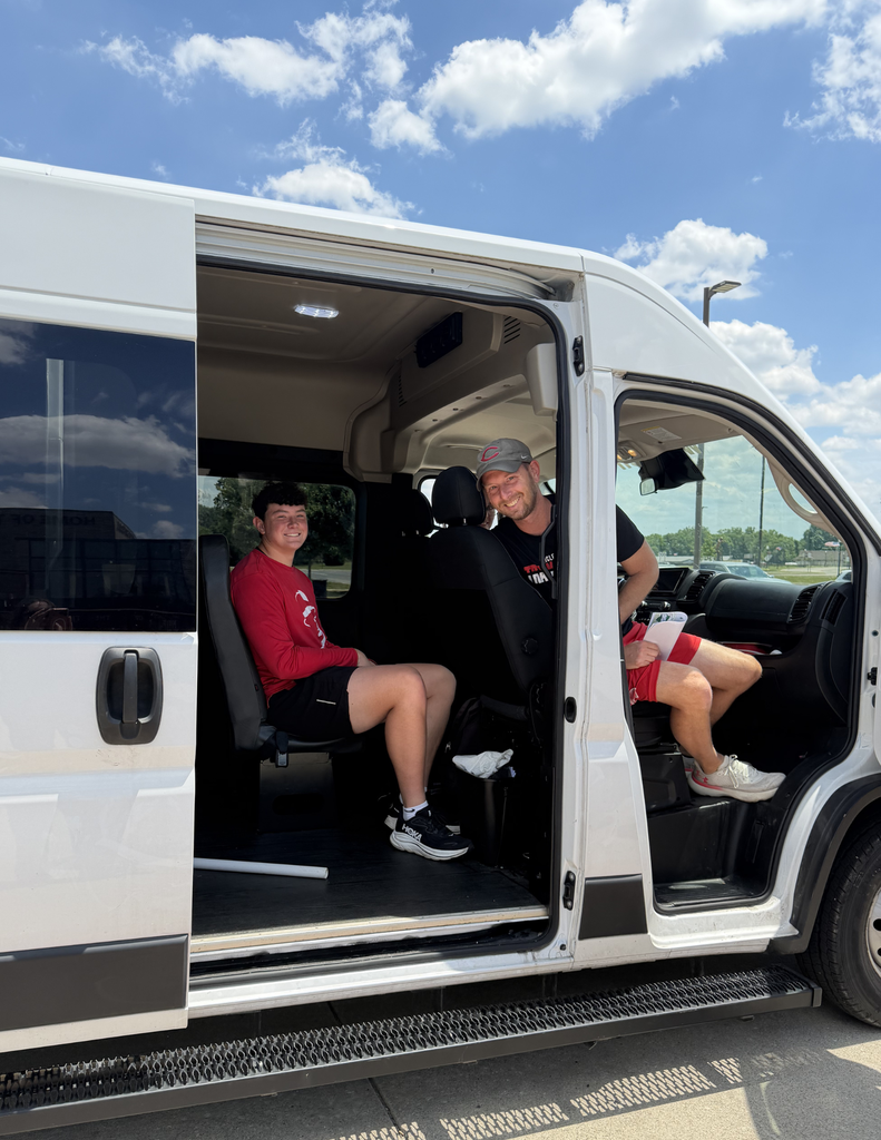 Liam McConnell and COach Lennex ready to ride to the state track meet