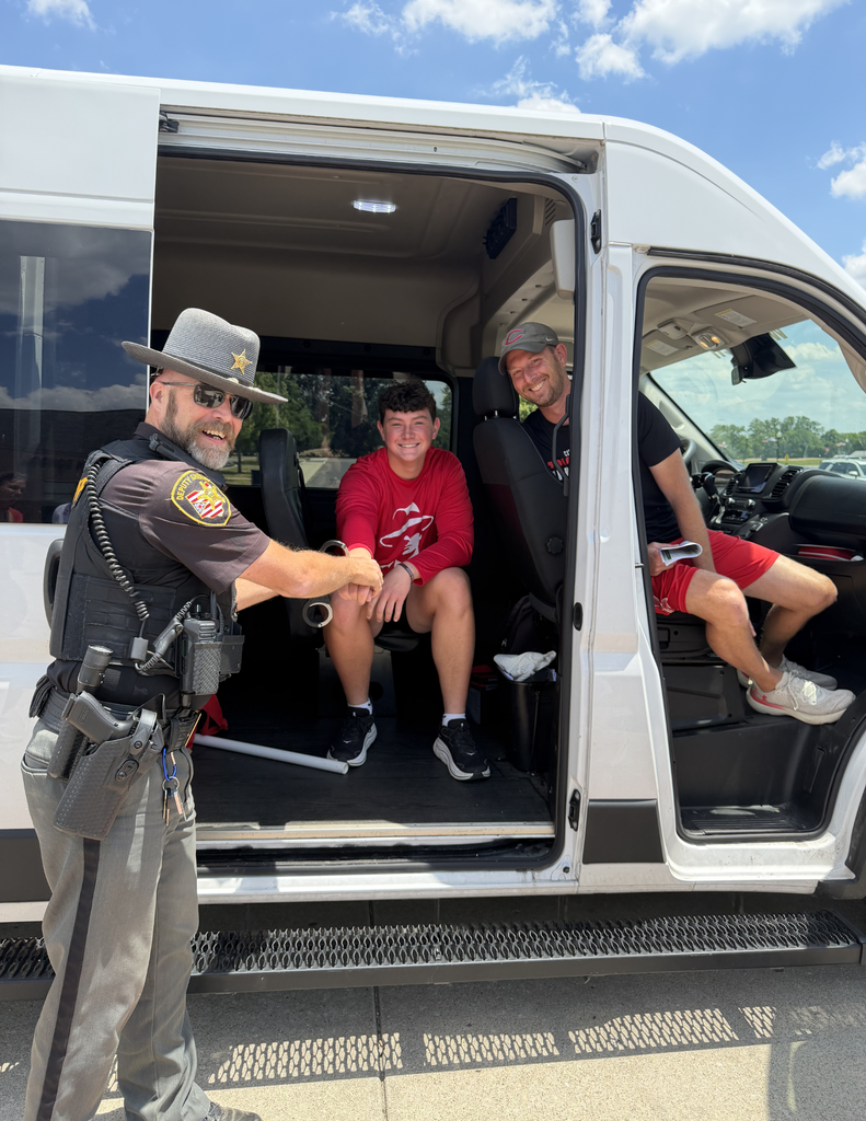 Liam McConnell and COach Lennex ready to ride to the state track meet