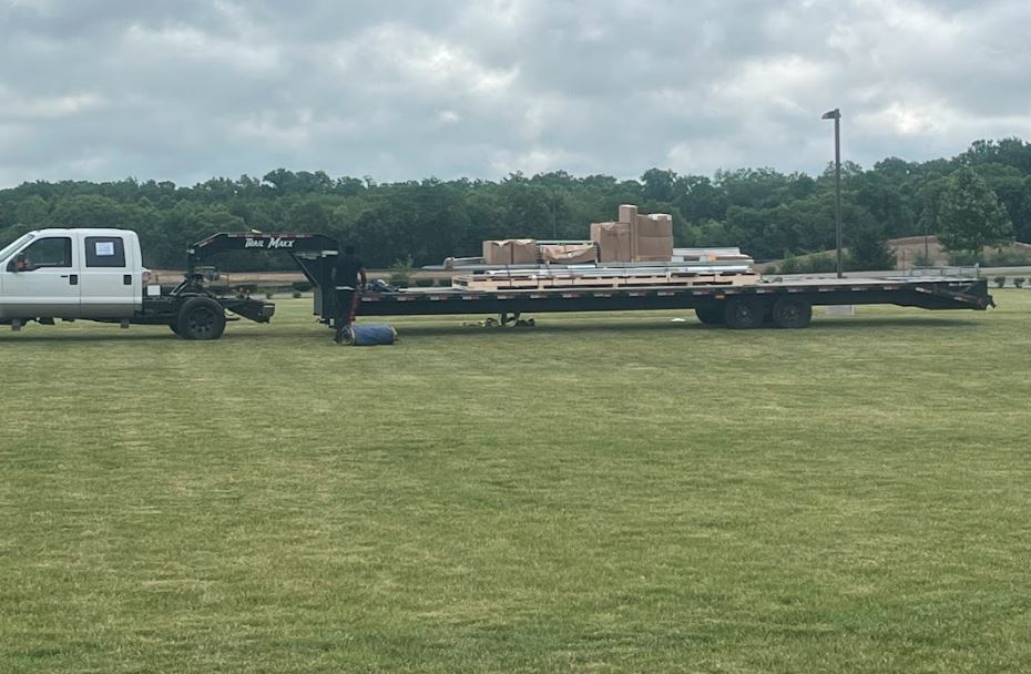 greenhouse materials arrive on large truck