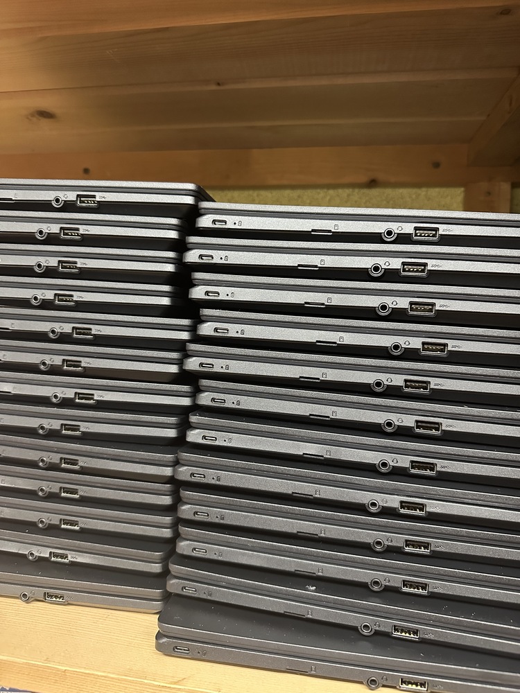 stack of Chromebooks