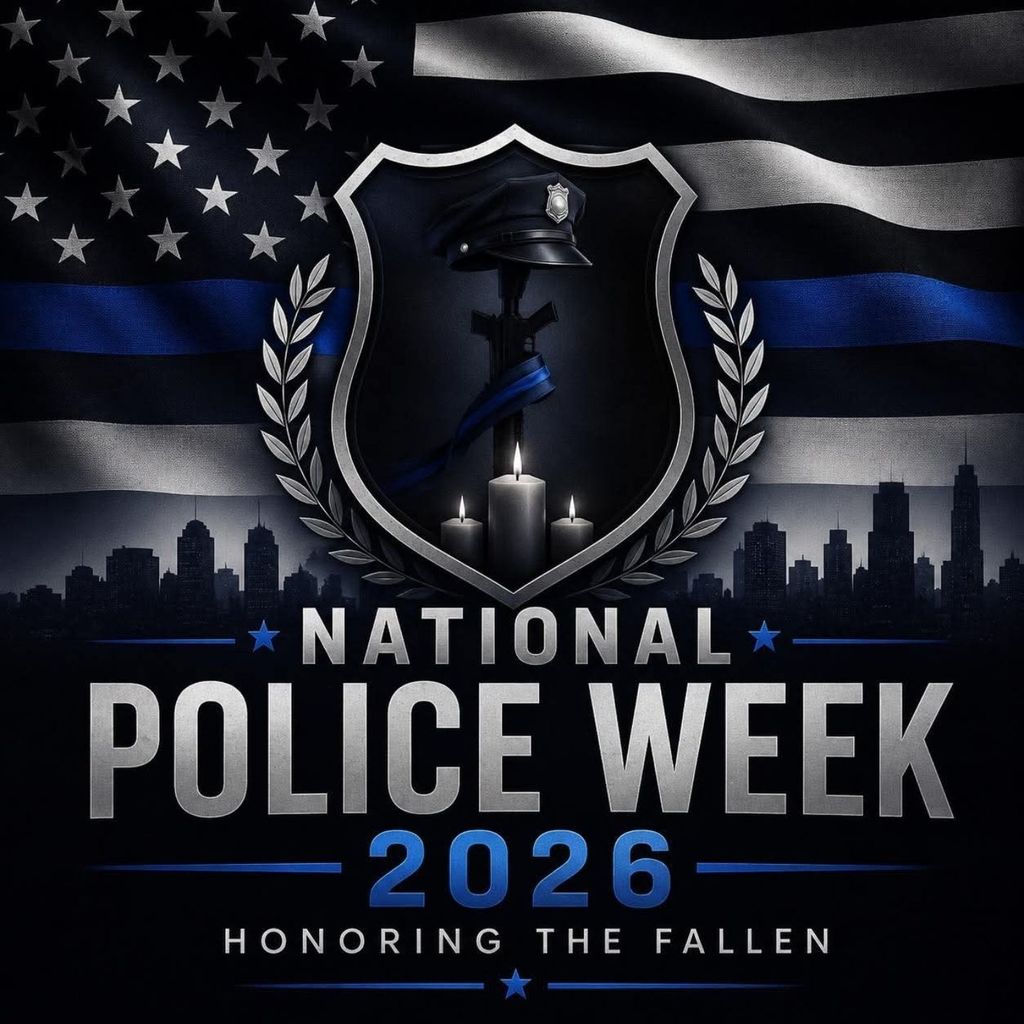 Graphic for National Police Week 2026 honoring fallen law enforcement officers. The design features a black and white American flag with a blue stripe, a police shield, candles, a police hat, a memorial rifle, laurel branches, and a city skyline. Text reads “National Police Week 2026, Honoring the Fallen.