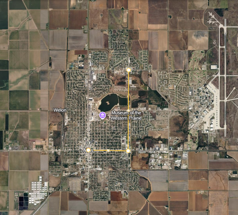 Satellite map of Altus showing a suggested alternate travel route west of Main Street during the ODOT US-283 resurfacing project. The highlighted route uses roads on the west side of the city to help drivers traveling across town reduce delays. This route is a travel suggestion only and is not an official detour. Main Street businesses remain open and accessible during construction.