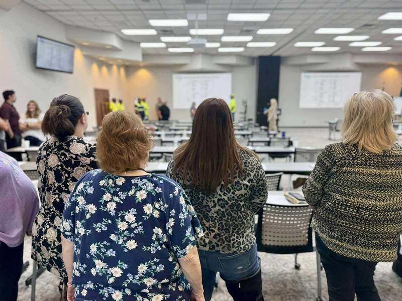 City of Altus Utility Billing team and other staff seated and standing in a training classroom.
