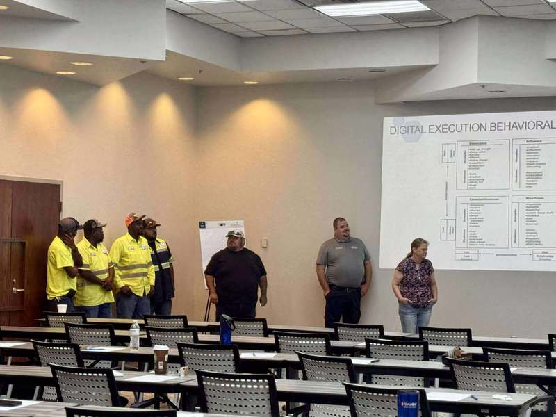 Group of City of Altus employees gathered in a classroom, listening to a presentation during training