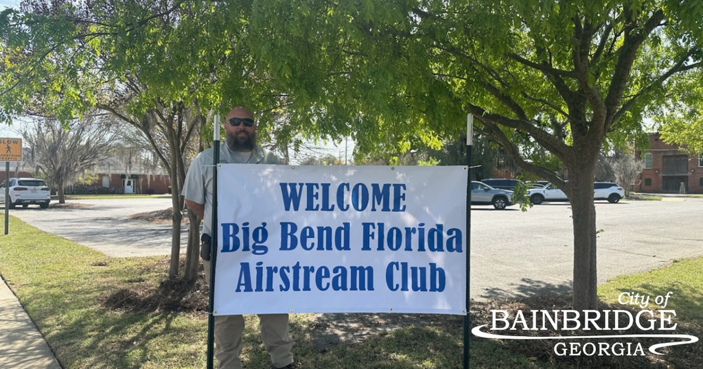 JOhn at welcoem sign