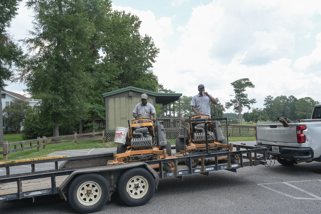 City of Bainbridge Parks department employees prepare for mowing at Earle May Boar Basin